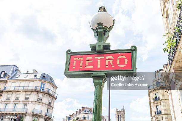 metro sign, paris, france - paris metro sign stock pictures, royalty-free photos & images