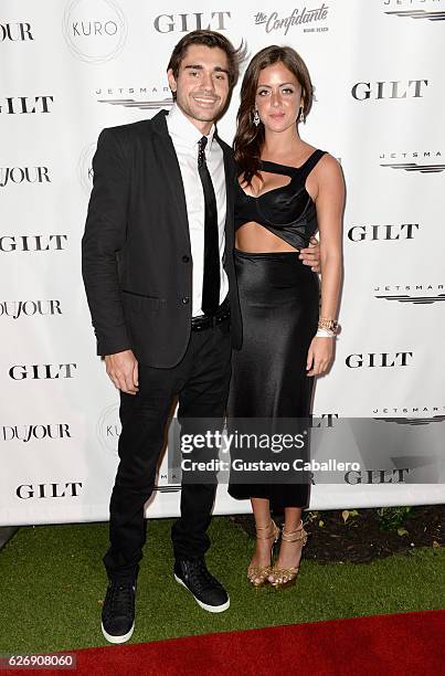 Tytin's Alexa Greenfield and a model wearing Tytin attend the DuJour Media, Gilt & JetSmarter party to kick off Art Basel at The Confidante on...