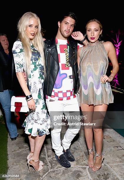 Karen Shiboleth, Andrew Warren, and Gaia Matisse attend the DuJour Media, Gilt & JetSmarter party to kick off Art Basel at The Confidante on November...