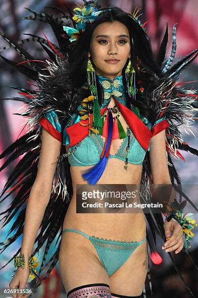 Ming Xi walks the runway at the Victoria's Secret Fashion Show on November 30, 2016 in Paris, France.