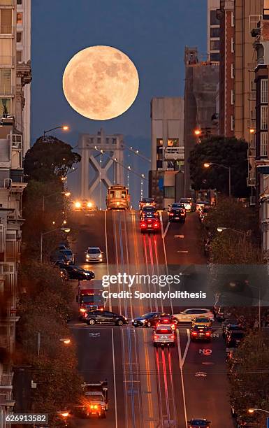 supermoon at california street composition, san francisco - moody sky moon night stock pictures, royalty-free photos & images