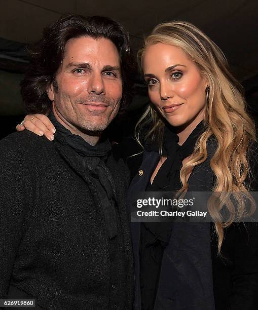 Greg Lauren and Elizabeth Berkley attend the Greg Lauren For Banana Republic Event at Greg Lauren Studio on November 30, 2016 in Los Angeles,...