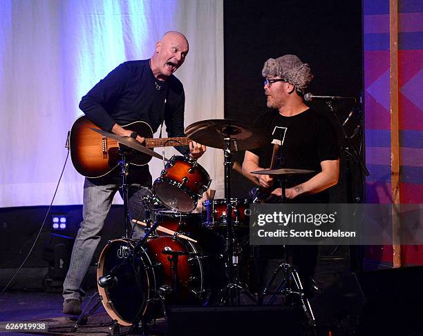 Actors/musicians Creed Bratton and Rainn Wilson from the TV show The Office perform onstage during Creed Bratton's benefit concert for Lide Haiti at...