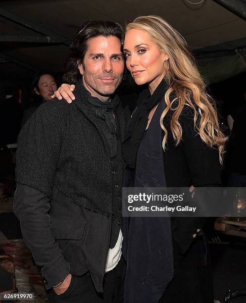 Greg Lauren and Elizabeth Berkley attend the Greg Lauren For Banana Republic Event at Greg Lauren Studio on November 30, 2016 in Los Angeles,...