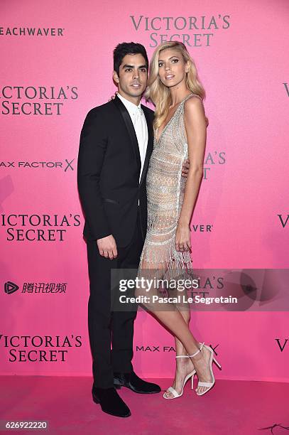 Devon Windsor and guest attends the 2016 Victoria's Secret Fashion Show after party on November 30, 2016 in Paris, France.