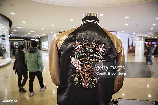 Jacket with a logo from the movie "The Great Wall" is displayed at an Mtime.com Inc. Kiosk in Beijing, China, on Thursday, Nov. 24, 2016. Mtime, the...