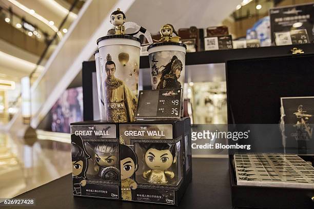 Merchandise from the movie "The Great Wall" is displayed for sale at an Mtime.com Inc. Kiosk at a shopping mall in Beijing, China, on Thursday, Nov....