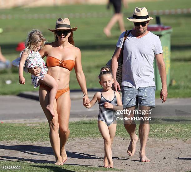 Steven Jacobs and his wife Rose pictured at the beach with their two daughters on November 13, 2016 in Sydney, Australia.