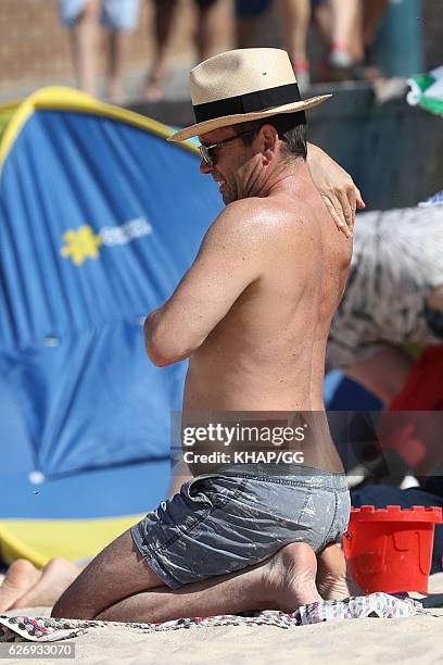 Steven Jacobs and his wife Rose pictured at the beach with their two daughters on November 13, 2016 in Sydney, Australia.