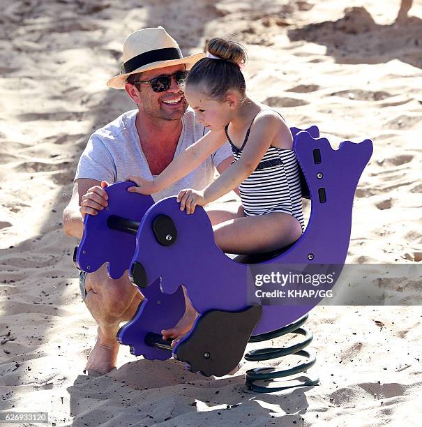 Steven Jacobs and his wife Rose pictured at the beach with their two daughters on November 13, 2016 in Sydney, Australia.