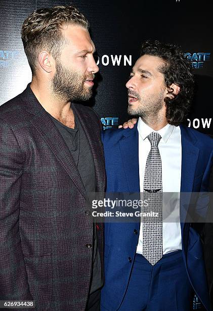 Jai Courtney;Shia LaBeouf arrives at the Premiere Of Lionsgate Premiere's "Man Down" at ArcLight Hollywood on November 30, 2016 in Hollywood,...
