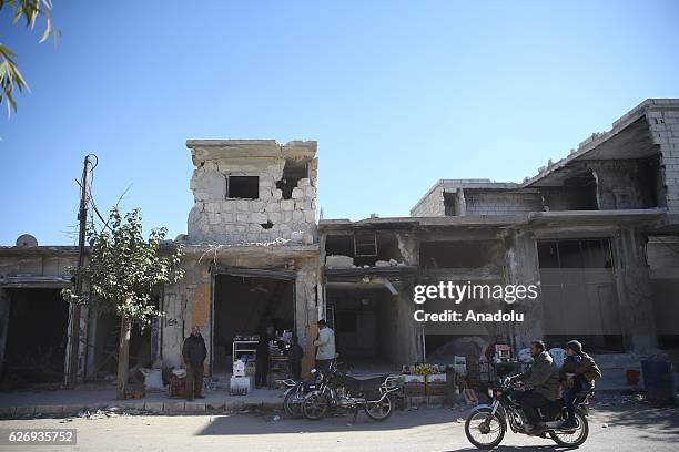 Civilian residents are seen during their daily life after Cobanbey town of Al-Bab District near Jarabulus District freed from Daesh terrorists by...