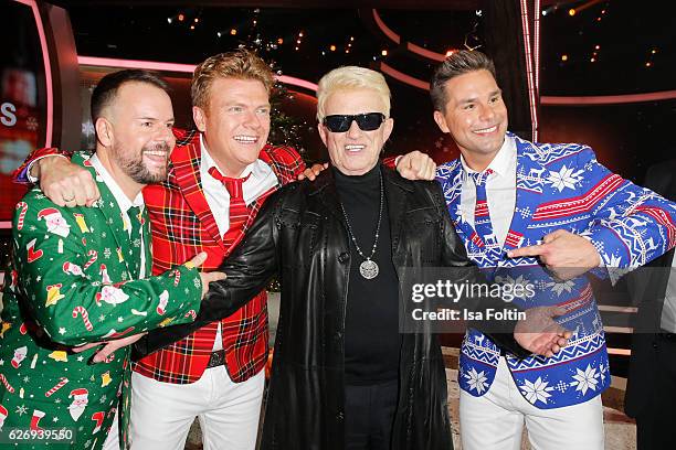 Caught in the Act and german singer Heino attend the tv show 'Die schoensten Weihnachtshits' on November 30, 2016 in Munich, Germany.