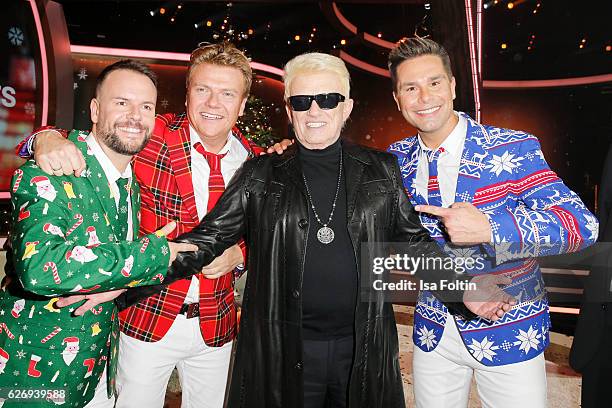 Caught in the Act and german singer Heino attend the tv show 'Die schoensten Weihnachtshits' on November 30, 2016 in Munich, Germany.