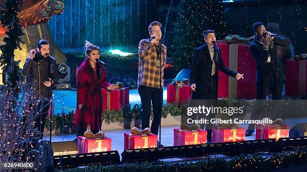 Avi Kaplan, Kirstin Maldonado, Scott Hoying, Mitch Grassi and Kevin Olusola of the a cappella group Pentatonix perform on stage during the 84th...