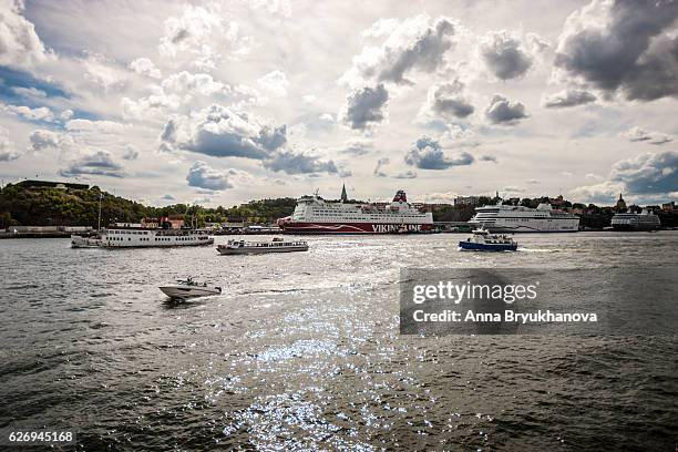 cruise ships and leisure boats in stockholm, sweden - viking line stock pictures, royalty-free photos & images