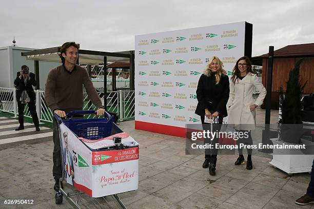 Carlos Moya and Carolina Cerezuela present '2016 Gift Triathlon' at El Corte Ingles store on November 30, 2016 in Madrid, Spain.