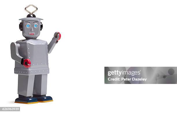 studio shot of silver robot with copy space - bot stock pictures, royalty-free photos & images