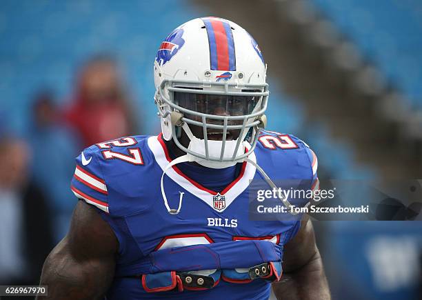 James Ihedigbo of the Buffalo Bills warms up before the start of NFL game action against the Jacksonville Jaguars at New Era Field on November 27,...