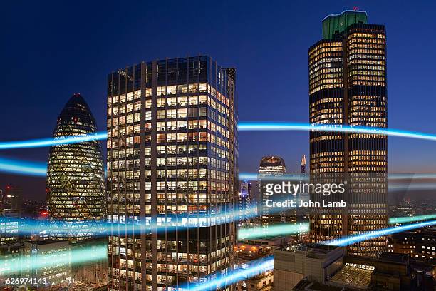 city communications - illuminated stock pictures, royalty-free photos & images