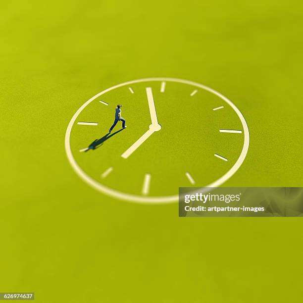 clock shaped path with man - verval stockfoto's en -beelden