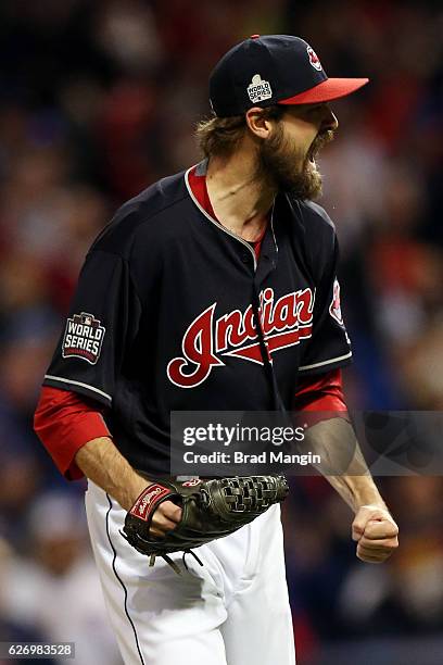 Andrew Miller of the Cleveland Indians reacts to striking out David Ross of the Chicago Cubs with the bases loaded to end the top of the seventh...