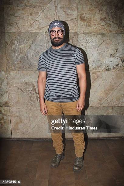 Bollywood actor Aamir Khan during screening of making of Dangal at Lightbox, Santacruz on November 28, 2016 in Mumbai, India. Dangal is a sports...