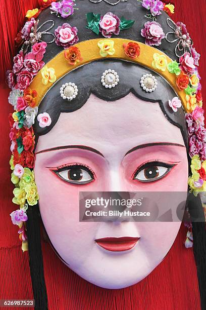 closeup of hand-painted asian mask - chinese mask stockfoto's en -beelden