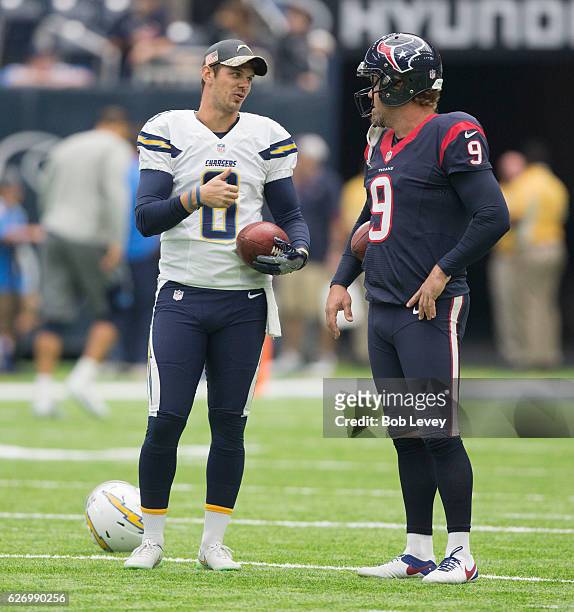 Drew Kaser of the San Diego Chargers and Shane Lechler of the Houston Texans chat before the game at NRG Stadium on November 27, 2016 in Houston,...