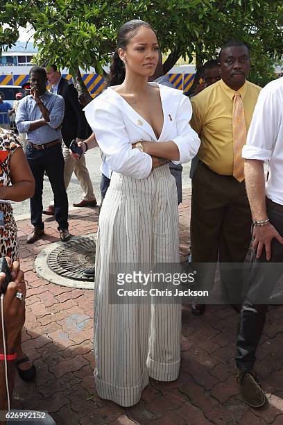 Rihanna attends the 'Man Aware' event held by the Barbados National HIV/AIDS Commission on the eleventh day of an official visit on December 1, 2016...