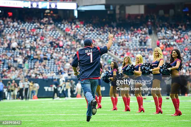 Tour golfer and Houston native Patrick Reed is introduced as Honorary Captain before the NFL football game between the San Diego Chargers and Houston...