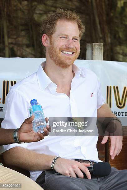 Prince Harry speaks on stage at 'Nature Fun Ranch' on the eleventh day of an official visit on December 1, 2016 in St Andrew, Barbados. The ranch...