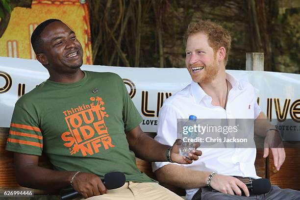 Prince Harry speaks on stage at 'Nature Fun Ranch' on the eleventh day of an official visit on December 1, 2016 in St Andrew, Barbados. The ranch...