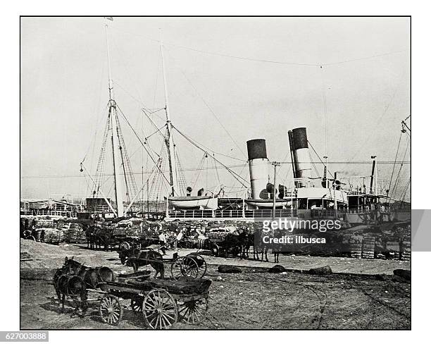 antique photograph of cotton steamer in new orleans - vintage riverboat stock illustrations