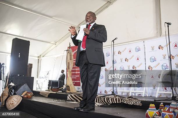 Deputy President of South Africa Cyril Ramaphosa delivers a speech during an event to raise awareness on World AIDS Day at Sinaba Stadium in Daveyton...
