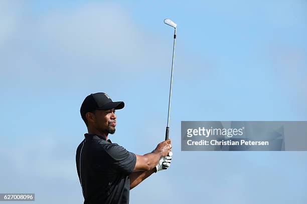 Tiger Woods of the United States hits his tee shot on the second hole during round one of the Hero World Challenge at Albany, The Bahamas on December...