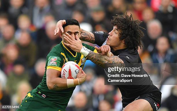 Australia's Valentine Holmes is tackled by New Zealand's Kevin Proctor during the Four Nations match between the New Zealand Kiwis and Australian...