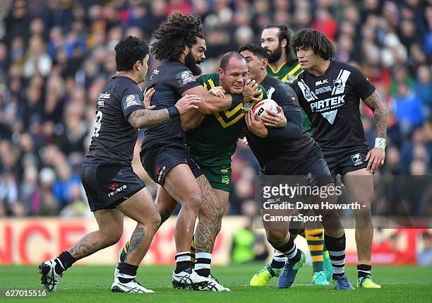 Australia's Matthew Scott takes on the New Zealand defence during the Four Nations match between the New Zealand Kiwis and Australian Kangaroos at...