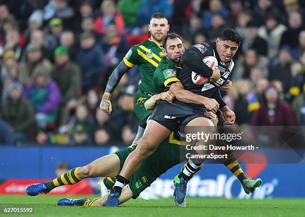 New Zealand's Jason Taumalolo is tackled during the Four Nations match between the New Zealand Kiwis and Australian Kangaroos at Anfield on November...