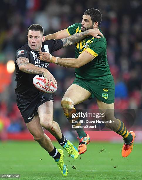 New Zealand's Shaun Kenny-Dowall is tackled by Australia's Cameron Smith during the Four Nations match between the New Zealand Kiwis and Australian...