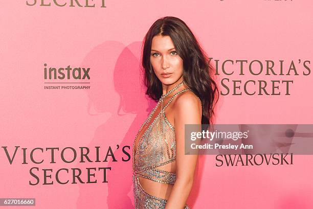 Bella Hadid arrives at the 2016 Victoria's Secret Fashion Show Afterparty at Le Grand Palais on November 30, 2016 in Paris, France.