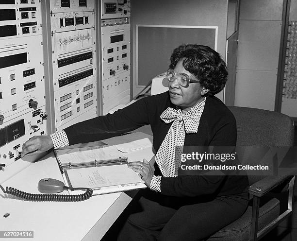 Mathmatician Mary Jackson, the first black woman engineer at NASA poses for a photo at work at NASA Langley Research Center on January 7, 1980 in...