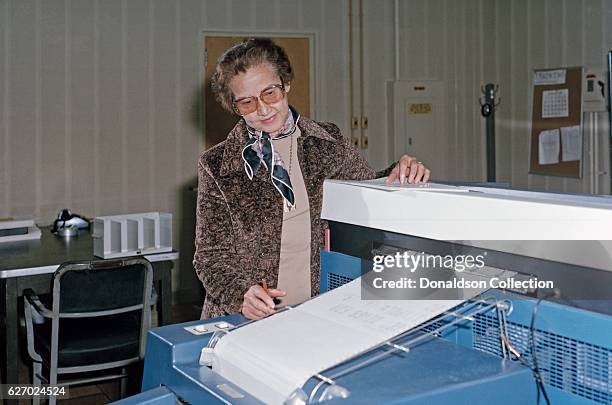 Space scientist, and mathematician Katherine Johnson poses for a portrait at work at NASA Langley Research Center in 1980 in Hampton, Virginia.