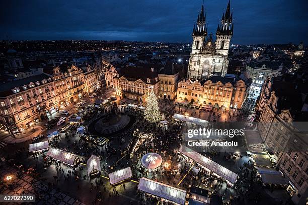 General view of the illuminated Old Town Square at the Christmas market at Old Town Square in Prague, Czech Republic on December 1, 2016. Christmas...