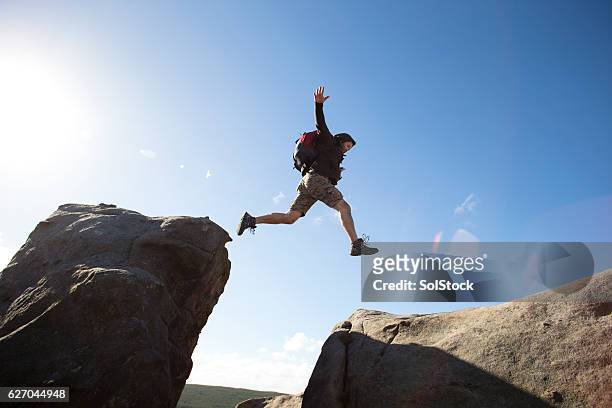 getting down is the hard bit - boulder rock stock pictures, royalty-free photos & images