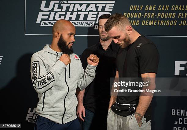 Flyweight champion Demetrious Johnson and TUF 24 winner Tim Elliott face off during the TUF Finale Ultimate Media Day in the Palms Resort & Casino on...