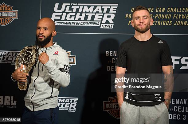 Flyweight champion Demetrious Johnson and TUF 24 winner Tim Elliott pose for a picture during the TUF Finale Ultimate Media Day in the Palms Resort &...