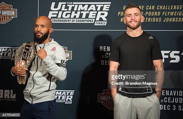 Flyweight champion Demetrious Johnson and TUF 24 winner Tim Elliott pose for a picture during the TUF Finale Ultimate Media Day in the Palms Resort &...