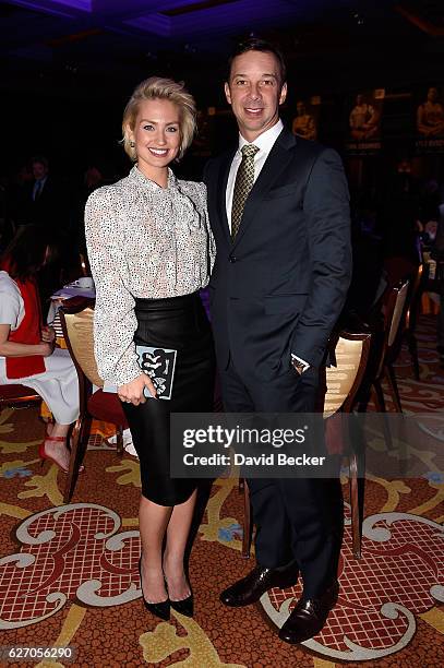 Chad Knaus, crew chief of the Chevrolet, and his wife Brooke Werner pose for a photo after the NASCAR NMPA Myers Brothers Awards Luncheon at The Wynn...