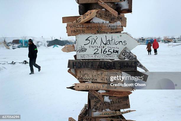 Snow covers the ground at Oceti Sakowin Camp on the edge of the Standing Rock Sioux Reservation on December 1, 2016 outside Cannon Ball, North...